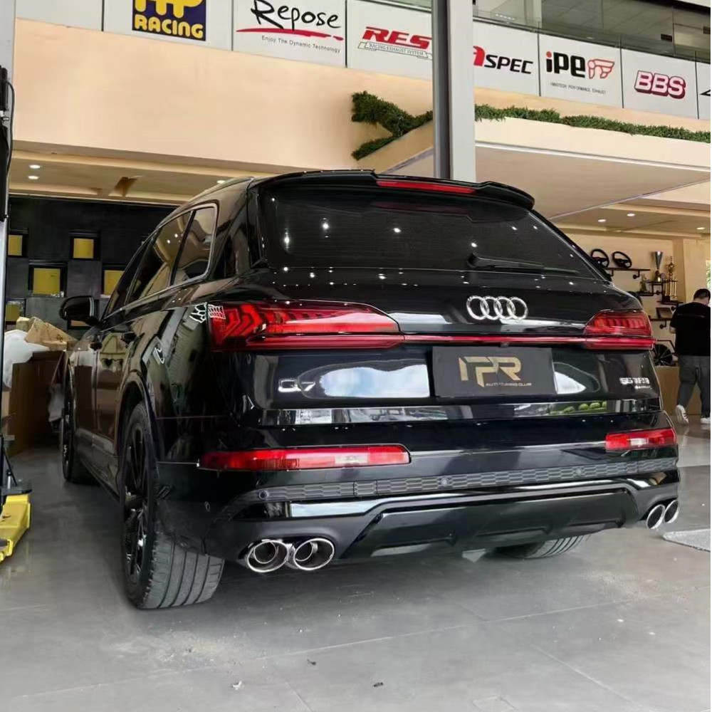 3821675128320820.jpg sq7 diffuser on car.jpg